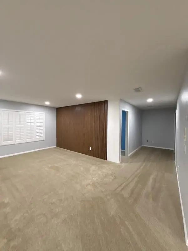 Open living space with accent wall